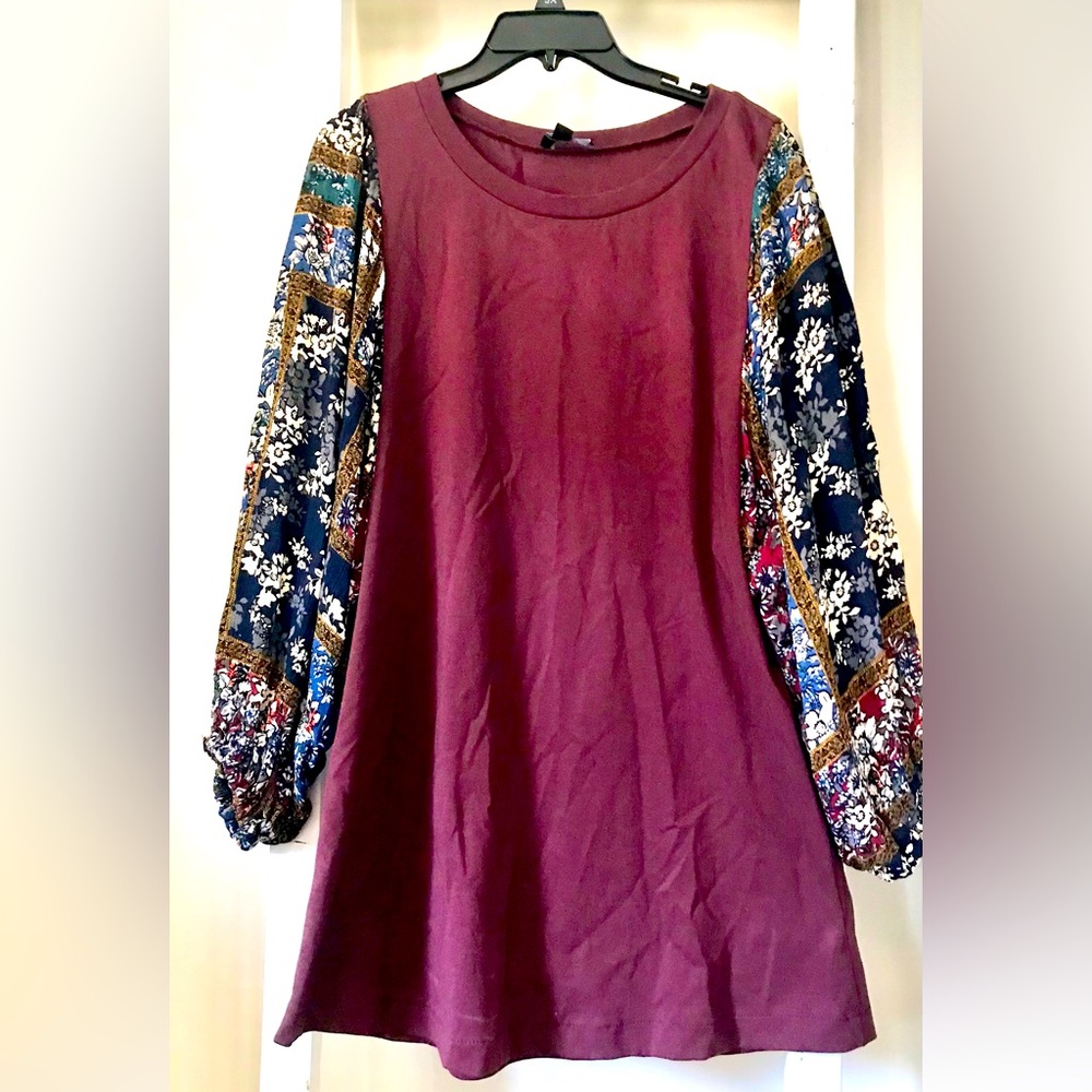 Wine dress with beautiful floral flow sleeves.
